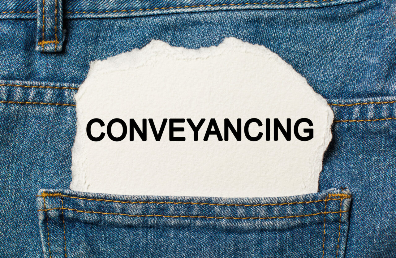 Conveyancing Sign in Back Pocket